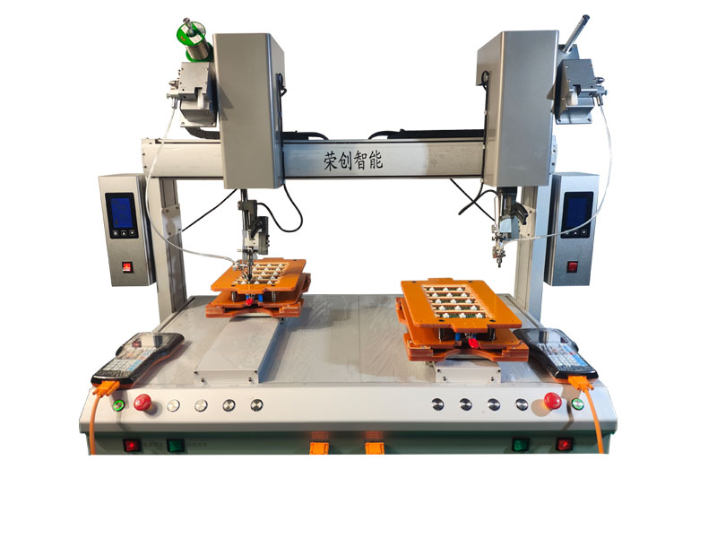 Double head rotating dual station soldering machine